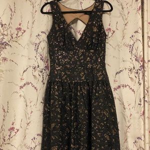 BCBG black lace dress. Gorgeous detail with sparkles throughout
